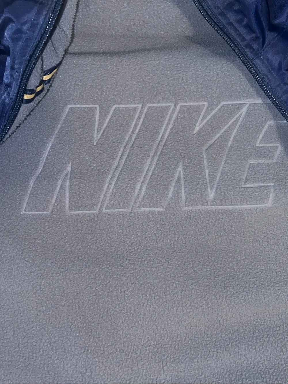 Nike Men’s Navy Windbreaker Jacket with Gold Stripe Accents